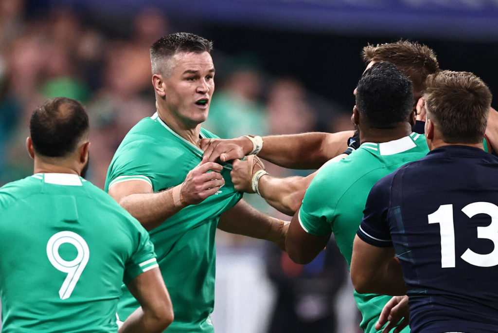 Ireland's flyhalf Jonathan Sexton tussles with Scotland's players during the France 2023 Rugby World Cup Pool B match between Ireland and Scotland at the Stade de France in Saint-Denis, on the outskirts of Paris on October 7, 2023.