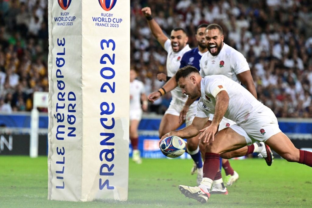 England's scrum-half Danny Care (C) scores a try during the France 2023 Rugby World Cup Pool D match between England and Samoa at the Stade Pierre-Mauroy in Villeneuve-d'Ascq, near Lille, northern France on October 7, 2023.