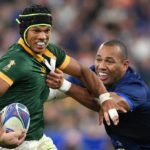 PARIS, FRANCE - OCTOBER 15: Kurt-Lee Arendse of South Africa is tackled by Gael Fickou of France during the Rugby World Cup France 2023 Quarter Final match between France and South Africa at Stade de France on October 15, 2023 in Paris, France. (Photo by David Ramos - World Rugby/World Rugby via Getty Images)