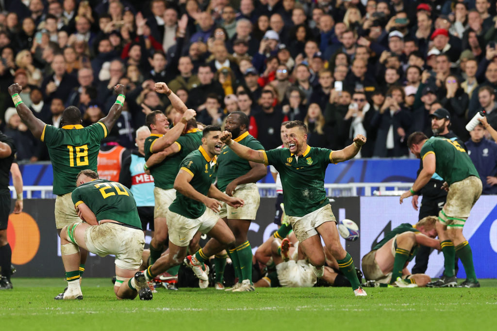PARIS, FRANCE - OCTOBER 28: Handre Pollard of South Africa celebrates with teammates following the team’s victory at the final whistle during the Rugby World Cup Final match between New Zealand and South Africa at Stade de France on October 28, 2023 in Paris, France.
