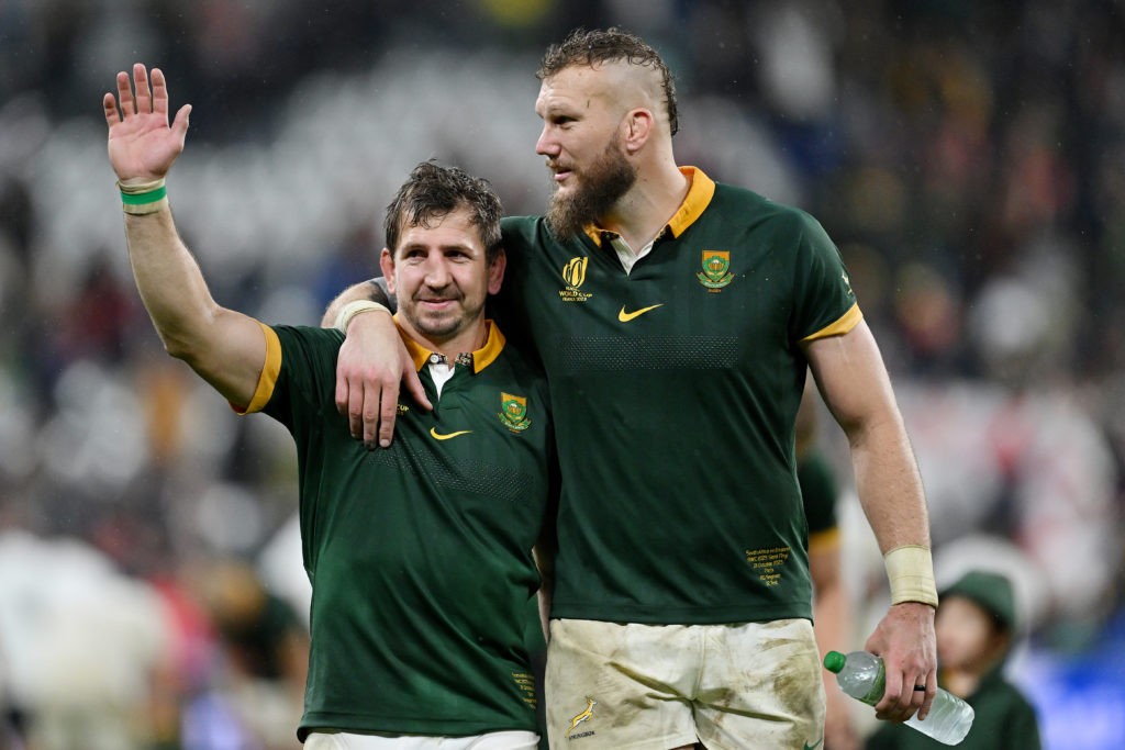 PARIS, FRANCE - OCTOBER 21: Kwagga Smith and RG Snyman of South Africa celebrate following the team's victory during the Rugby World Cup France 2023 match between England and South Africa at Stade de France on October 21, 2023 in Paris, France. (Photo by Hannah Peters/Getty Images)