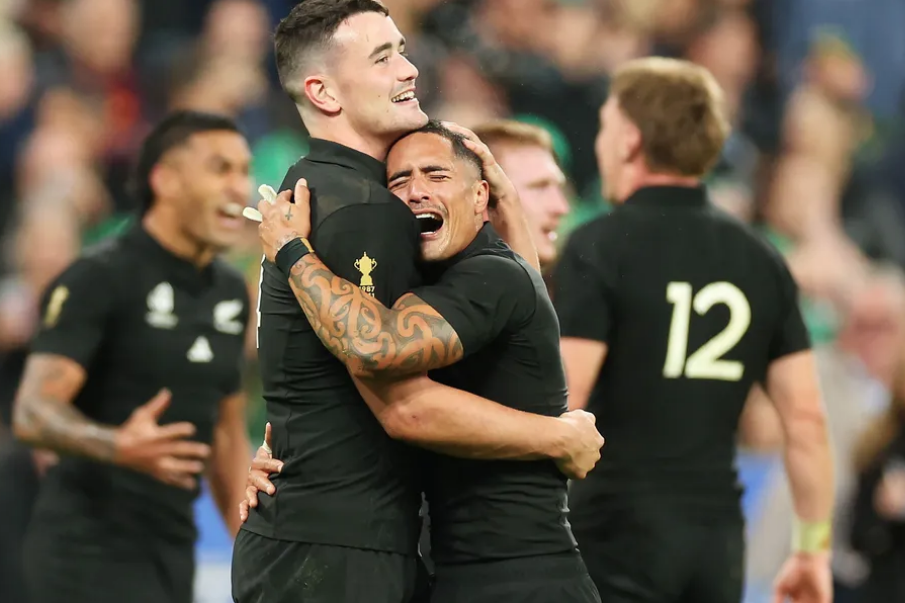 Will Jordan and Aaron Smith after the All Blacks knocked Ireland out the 2023 World Cup