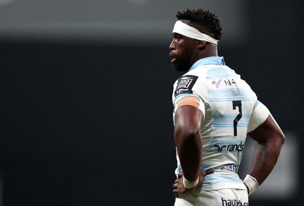 Racing 92's South-African back row Siya Kolisi looks on during the French Top 14 rugby union match between Racing 92 and La Rochelle at the Paris La Defense Arena in Nanterre, north-west of Paris on November 26, 2023.