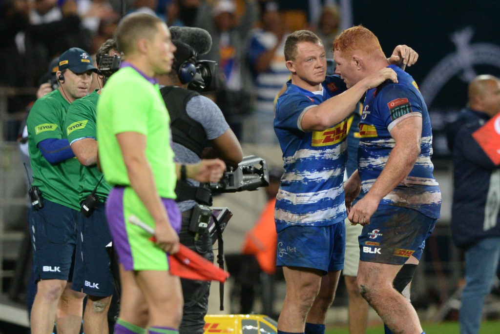 Deon Fourie of Stormers embraces Stormers captain Steven Kitshoff after his last game for the Stormers during the United Rugby Championship 2022/23 Grand Final between the Stormers and Munster at Cape Town Stadium on 27 May 2023 © Ryan Wilkisky/BackpagePix