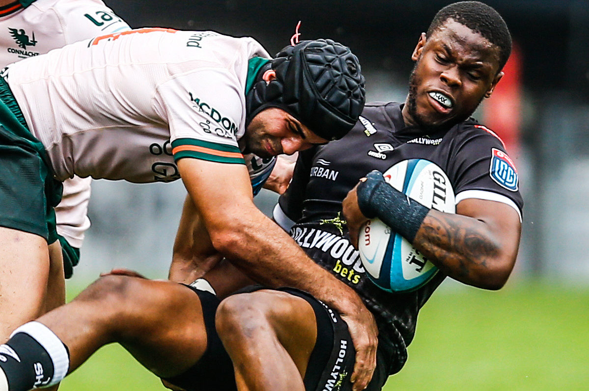 Sharks fullback Aphelele Fassi is tackled by Connacht wing Byron Ralston