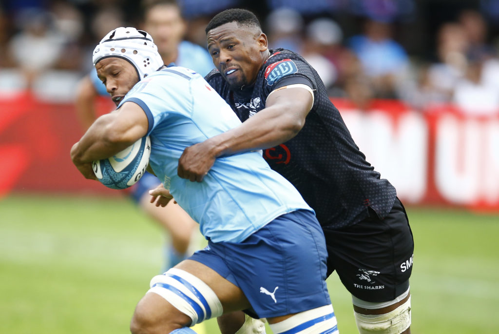 DURBAN, SOUTH AFRICA - DECEMBER 31: Sikhumbuzo Notshe of the Cell C Sharks tackling Nizaam Carr of the Vodacom Bulls during the United Rugby Championship match between Cell C Sharks and Vodacom Bulls at Hollywoodbets Kings Park Stadium on December 31, 2022 in Durban, South Africa. (Photo Mandatory Credit Steve Haag/Gallo Images)