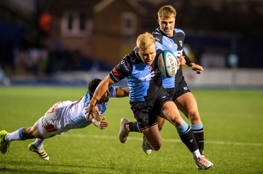 Mandatory Credit: Photo by Andrew Dowling/INPHO/Shutterstock (14203612am) Cardiff Rugby vs Vodacom Bulls. Cardiff's Tinus de Beer tackled by Embrose Papier of the Bulls BKT United Rugby Championship, Cardiff Arms Park, Wales - 10 Nov 2023