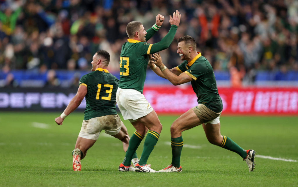 PARIS, FRANCE - OCTOBER 28: Jesse Kriel, Willie Le Roux and Handre Pollard of South Africa celebrate winning the Rugby World Cup France 2023 Gold Final match between New Zealand and South Africa at Stade de France on October 28, 2023 in Paris, France.