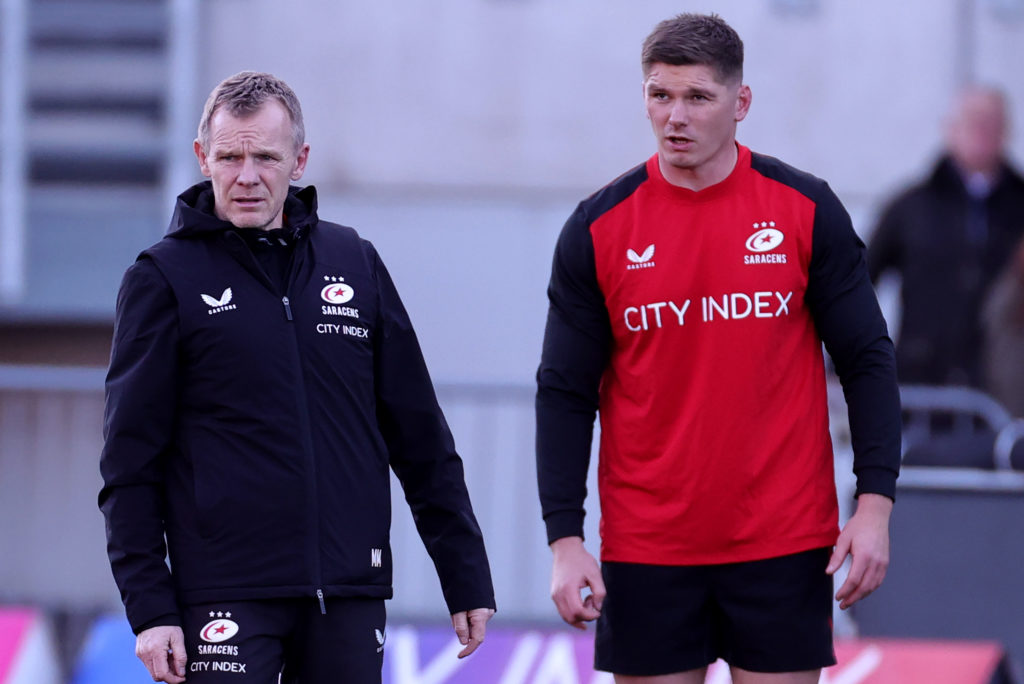 BARNET, ENGLAND - NOVEMBER 25: Mark McCall, (L) the Saracens director of rugby, talks to Saracens captain, Owen Farrell in the warm up during the Gallagher Premiership Rugby match between Saracens and Bristol Bears at the StoneX Stadium on November 25, 2023 in Barnet, England. (Photo by David Rogers/Getty Images)