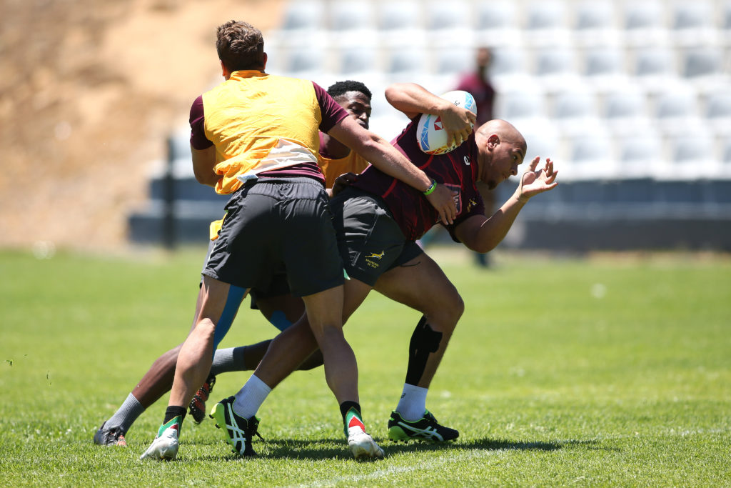 Zain Davids attempts to slip the tackle during the 2022 HSBC Cape Town Sevens South Africa training session held at Hamiltons Rugby Club in Cape Town on 06 November 2022 ©Shaun Roy/BackpagePix