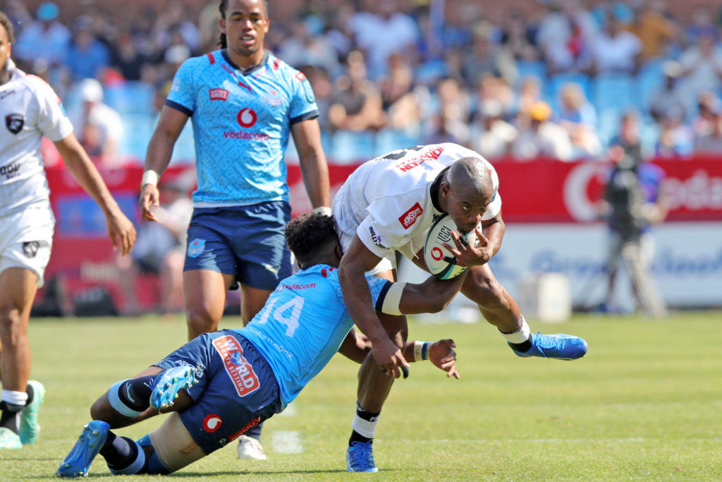 Makozole Mapimpi of Sharks tackled by Canan Moodie of Bulls during the 2023 United Rugby Championships match between Bulls and Sharks at Loftus Stadium in Pretoria on 02 December 2023 ©Samuel Shivambu/BackpagePix