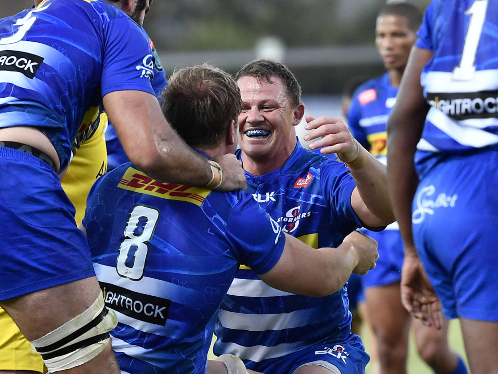 STELLENBOSCH, SOUTH AFRICA - DECEMBER 02: .Deon Fourie of the Stormers celebrate with Evan Roos of the Stormers after scoring a try during the United Rugby Championship match between DHL Stormers and Zebre at Danie Craven Stadium on December 02, 2023 in Stellenbosch, South Africa.