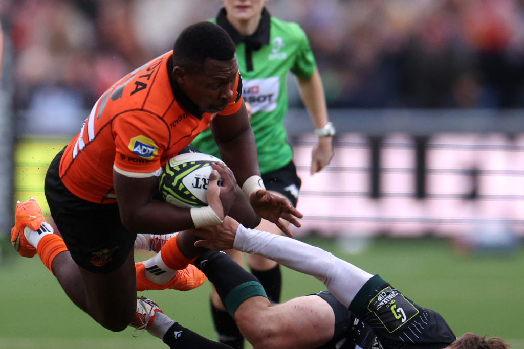 AMSTERDAM, NETHERLANDS - JANUARY 14: Ali Mgijima of Toyota Cheetahs is tackeld and stopped by Thomas Carol of Section Paloise during the EPCR Challenge Cup match between Toyota Cheetahs and Section Paloise at NRCA Stadium on January 14, 2024 in Amsterdam, Netherlands. (Photo by Dean Mouhtaropoulos/Getty Images)