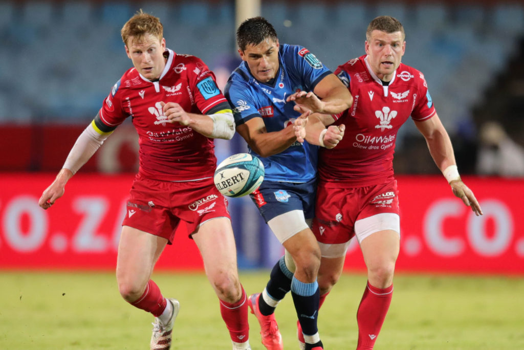 Harold Vorster of the Vodacom Bulls challenged by Rhys Patchell and Scott Williams of the Llanelli Scarlets during the United Rugby Championship 2021/22 game between the Vodacom Bulls and the Llanelli Scarlets at Loftus Versfeld Stadium, Pretoria on 18 March 2022 ©Samuel Shivambu/BackpagePix