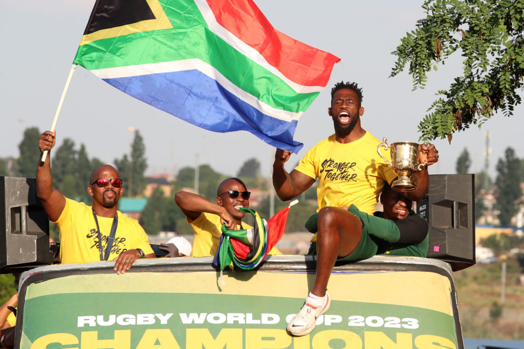 Siya Kolisi celebrates with fans during the 2023 Rugby World Cup South Africa Trophy Tour at the Vilakazi Street, Soweto on the 31 October 2023 ©Muzi Ntombela/BackpagePix