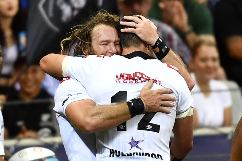 CAPE TOWN, SOUTH AFRICA - DECEMBER 30: Werner Kok of the Sharks celebrate after scoring a try during the United Rugby Championship match between DHL Stormers and Hollywoodbets Sharks at DHL Stadium on December 30, 2023 in Cape Town, South Africa.