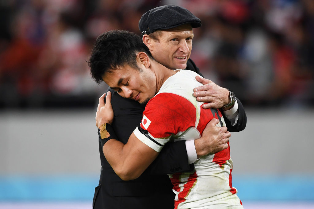 Japan assistant coach Tony Brown embraces Japan wing Kenki Fukoaka at the end of the match. Japan v South Africa. 1/4 Final, Rugby World Cup 2019. Tokyo Stadium, Japan, Saturday 20 October 2019. © Photo: Andrew Cornaga / www.Photosport.nz