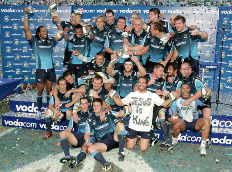 DURBAN, SOUTH AFRICA - MAY 19: Bulls players celebrate with the Super 14 trophy after the Super 14 Final match between the Sharks and the Bulls held at the Absa Stadium on May 19, 2007 in Durban, South Africa. (Photo by Duif du Toit/Gallo Images/Getty Images)