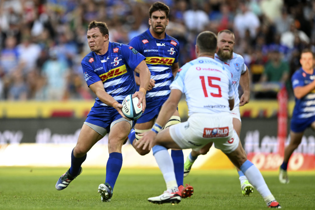 Deon Fourie (captain) of the Stormers is challenged by Willie le Roux of the Bulls during the 2023 United Rugby Championship game between the Stormers and Bulls at Cape Town Stadium on 23 December 2023 ©Ryan Wilkisky/BackpagePix