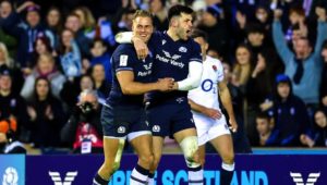 Scotland wing Duhan van der Merwe celebrates with teammate Blair Kinghorn after scoring a try against England at Murrayfield