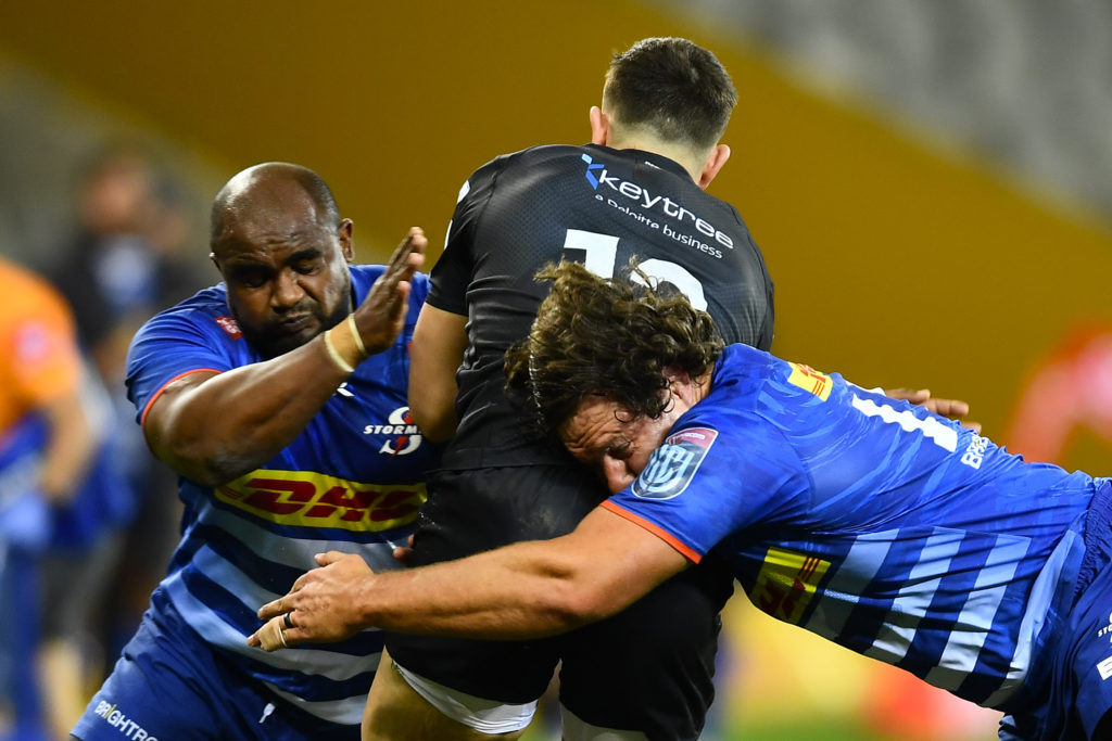 CAPE TOWN, SOUTH AFRICA - APRIL 02: Ali Vermaak and Neethling Fouche of the Stormers tackles Owen Watkin of Ospreys during the United Rugby Championship match between DHL Stormers and Ospreys at DHL Stadium on April 02, 2022 in Cape Town, South Africa. (Photo by Ashley Vlotman/Gallo Images)