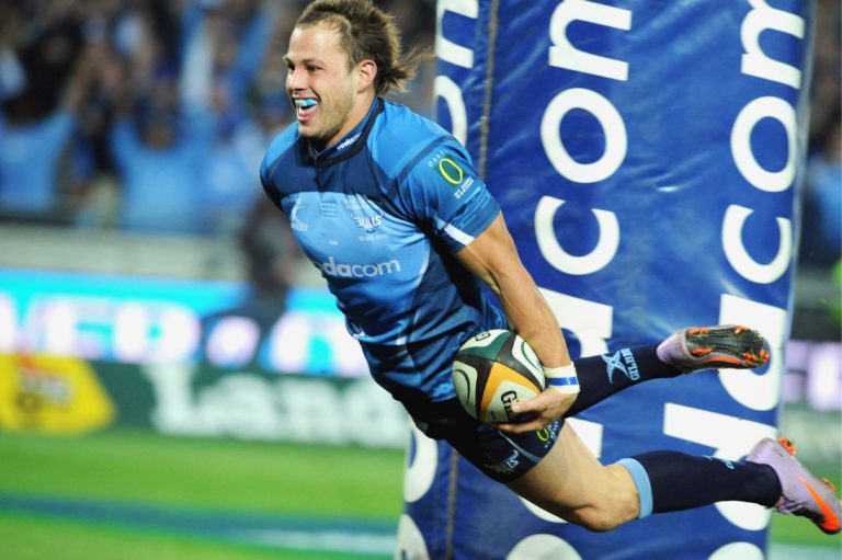 SOWETO, SOUTH AFRICA - MAY 29, Francois Hougaard of the Bulls scores the first try during the Super 14 final match between Vodacom Bulls and Vodacom Stormers from Orlando Stadium on May 29, 2010 in Soweto, South Africa. Photo by Lee Warren / Gallo Images