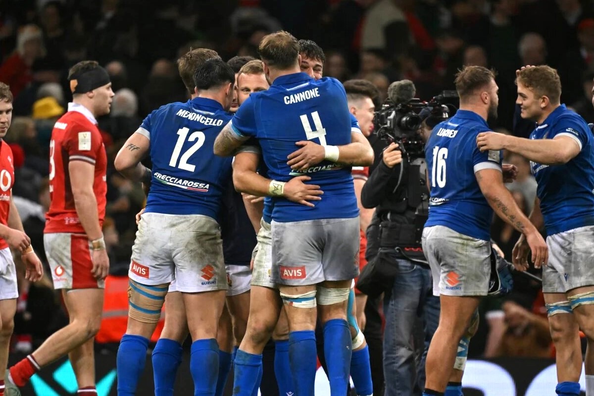 Italy celebrate their victory over Wales in Cardiff