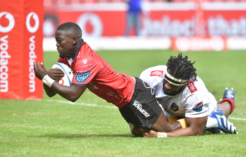 JOHANNESBURG, SOUTH AFRICA - MARCH 02: Sanele Nohamba of the Lions breaks the Sharks defence and score a try and celebrate with his teammates during the United Rugby Championship match between Emirates Lions and Hollywoodbets Sharks at Emirates Airline Park on March 02, 2024 in Johannesburg, South Africa. (Photo by Sydney Seshibedi/Gallo Images)