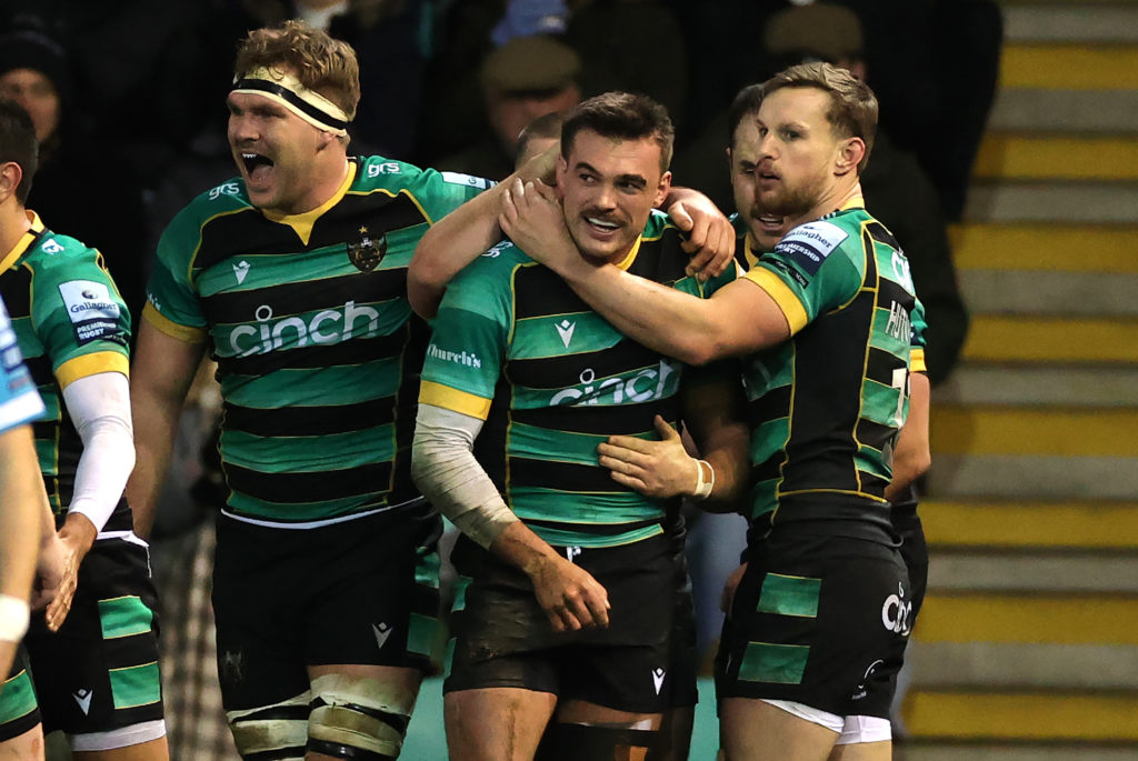 NORTHAMPTON, ENGLAND - DECEMBER 30: George Furbank of Northampton Saints celebrates with team mates after scoring their first try during the Gallagher Premiership Rugby match between Northampton Saints and Sale Sharks at cinch Stadium at Franklin's Gardens on December 30, 2023 in Northampton, England. (Photo by David Rogers/Getty Images)