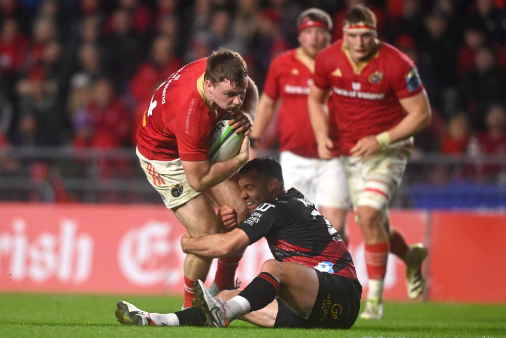 Cork , Ireland - 3 February 2024; Seán O'Brien of Munster is tackled by Ryan Crotty of Crusaders during the international rugby friendly match between Munster and Crusaders at SuperValu Páirc Uí Chaoimh in Cork. (Photo By Sam Barnes/Sportsfile via Getty Images)