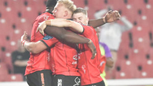 JOHANNESBURG, SOUTH AFRICA - MAY 11: Emmanuel Tshituka of the Lions scores a try and celebrate with his teammates during the United Rugby Championship match between Emirates Lions and Cardiff Rugby at Emirates Airline Park on May 11, 2024 in Johannesburg, South Africa. (Photo by Sydney Seshibedi/Gallo Images)